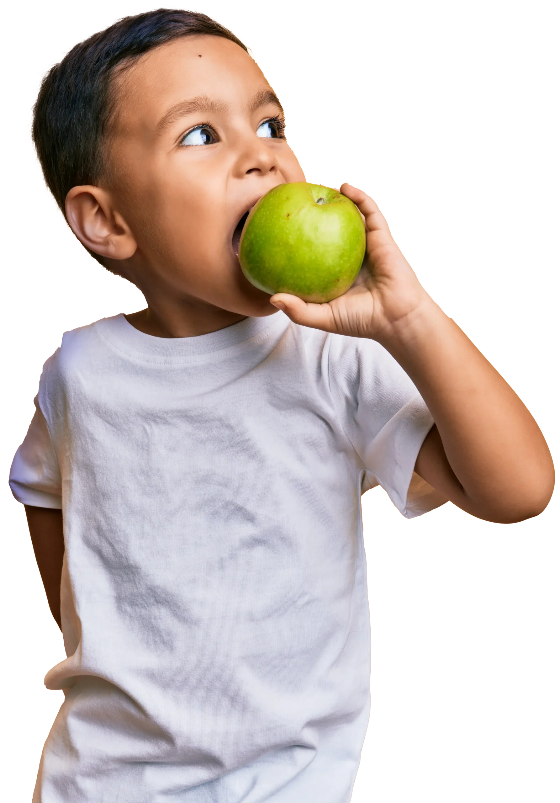 niño comiendo una manzana verde